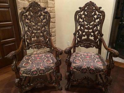Pair of Italian Donatello carved wood chairs